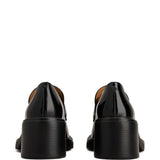 Tod's Luxurious Black Apron Toe Flat Shoes
