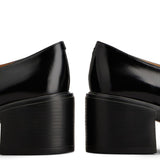 Tod's Luxurious Black Apron Toe Flat Shoes