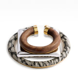 Jacquemus Trio of geometric ear-cuffs.