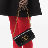 Valentino Garavani Vain small leather clutch