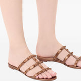 Valentino Garavani Rockstud Low Slide Sandal in Laminated Nappa Leather