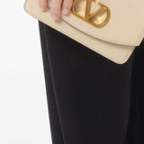 Valentino Garavani Vain Clutch in Shiny Calfskin